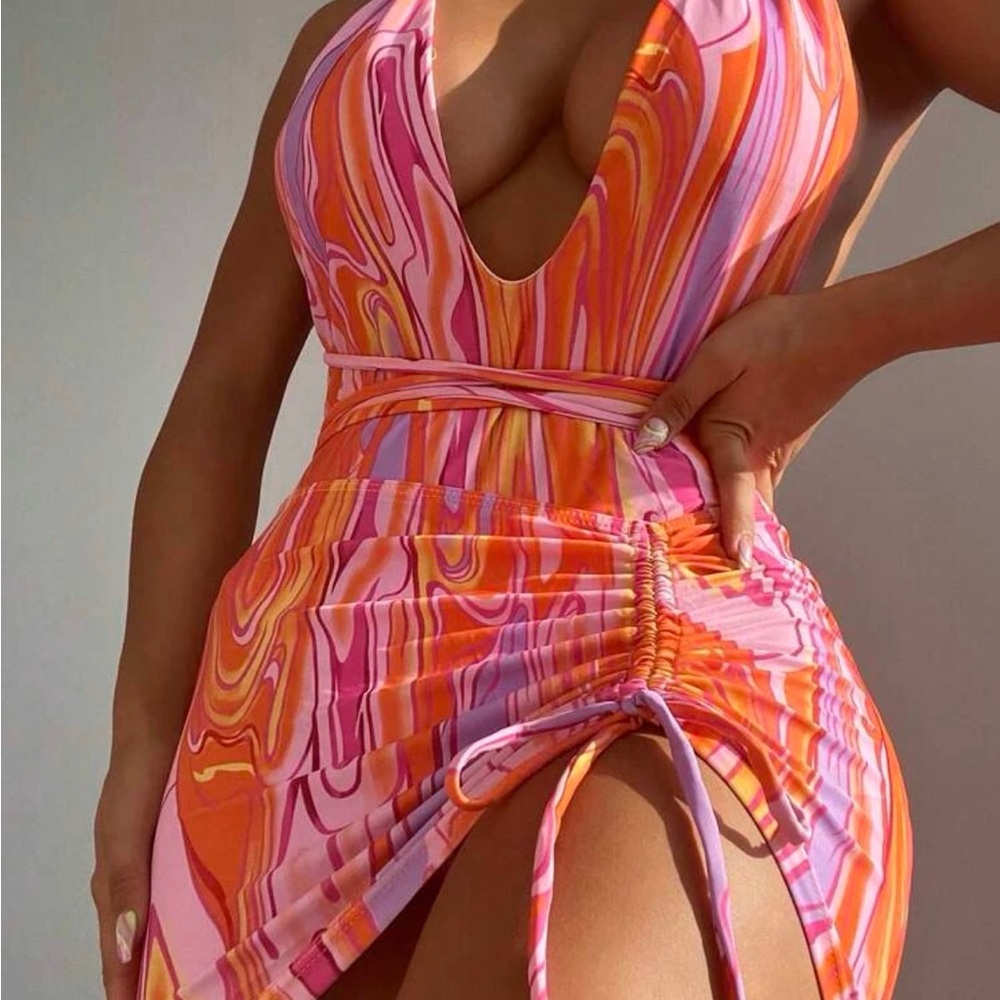 Plunging one piece swimsuit with skirt